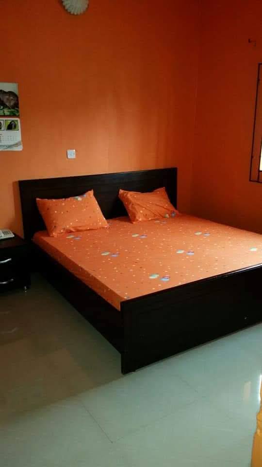 Guest room interior at PIKKMASTER BMV SUITE, 139 IBB Way, Calabar