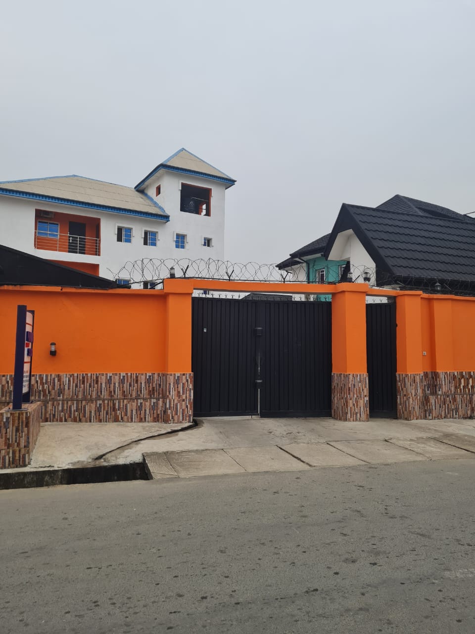 Exterior views and signage at PIKKMASTER BMV SUITE in Ewet Housing Estate Extension, Uyo